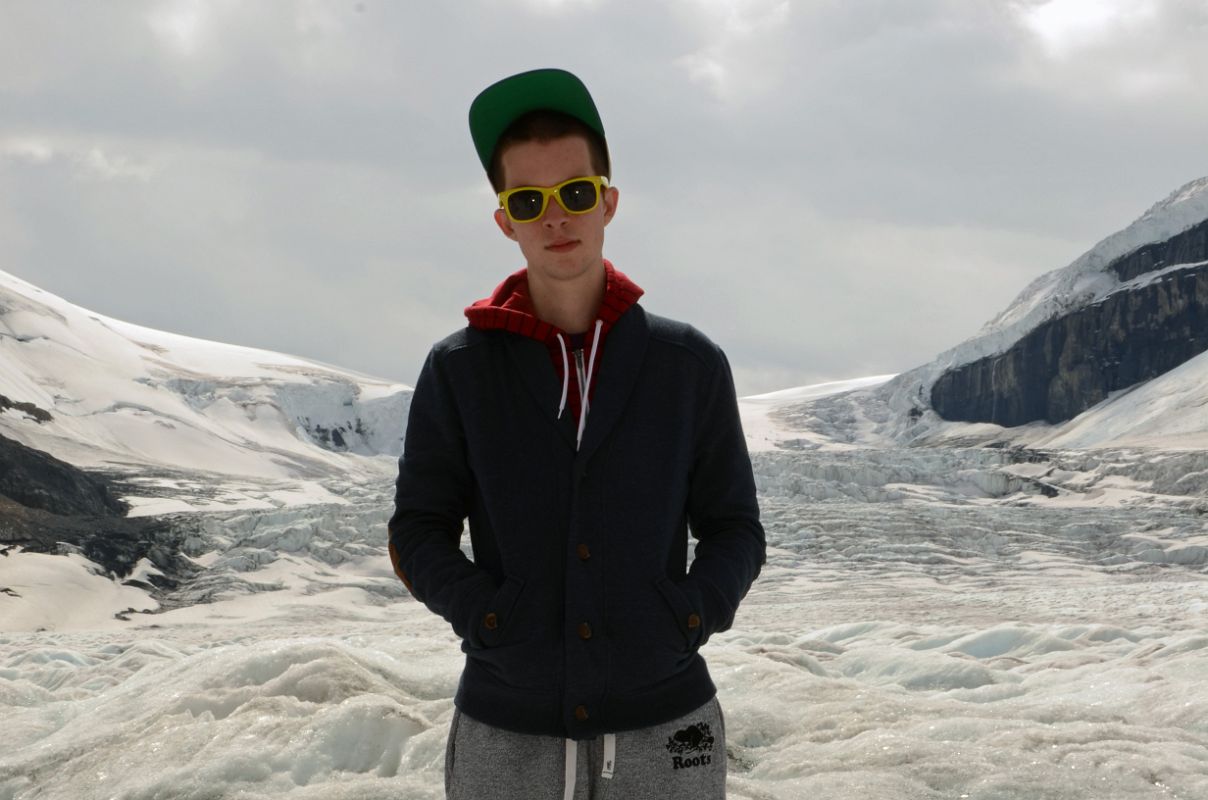 17 Peter Ryan On Athabasca Glacier With Icefall Behind In Summer From Columbia Icefield